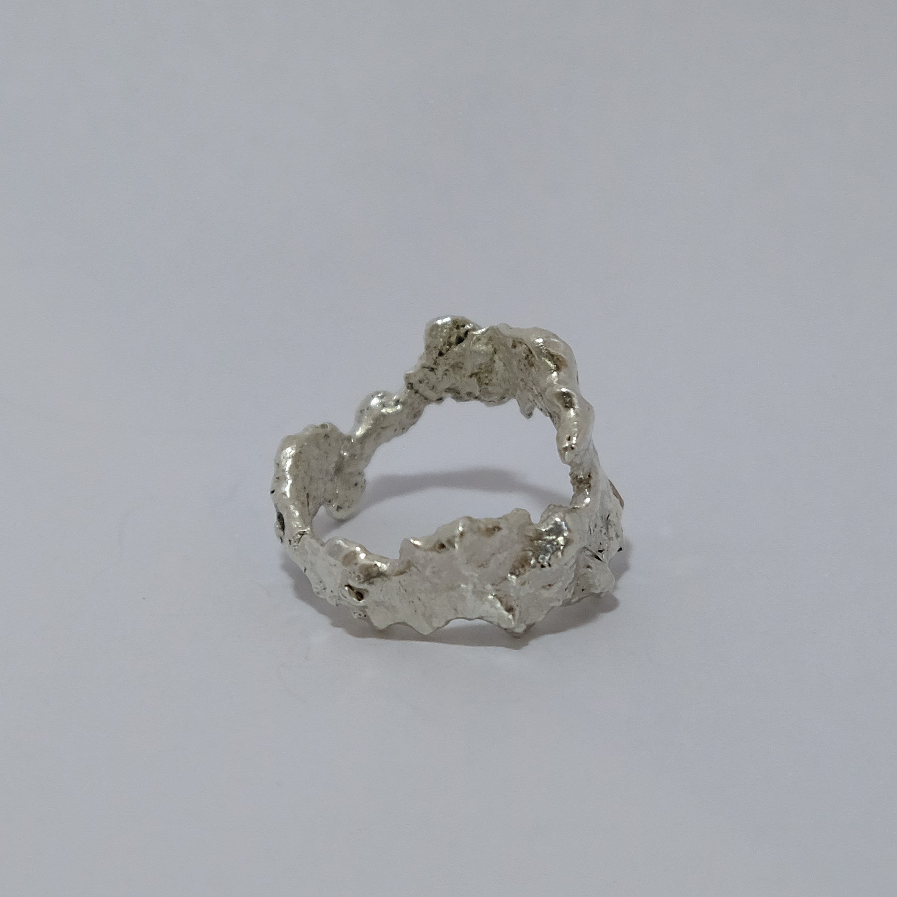 Silver coral ring with champagne gemstone, shown from side | Made with Grace | handmade jewellery nz