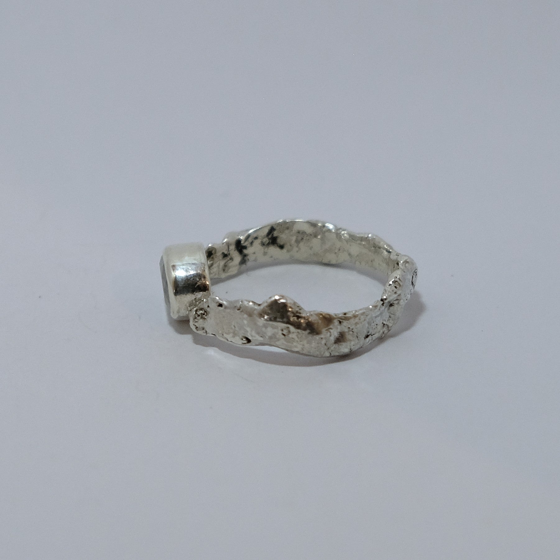 Silver and rainbow moonstone ring, shown from the side | Made with Grace | handmade jewellery nz