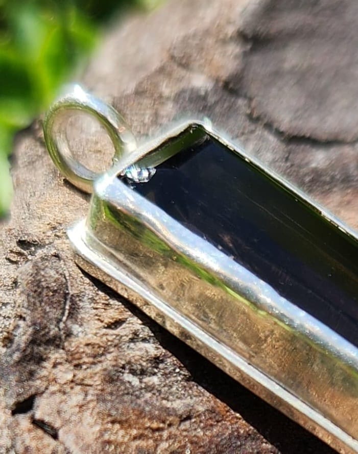 Silver and brown gemstone pendant with small chip in corner of stone | Made with Grace | handmade jewellery nz